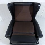 Black leather wingback chair on wheels 1960’s