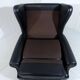 Fauteuil à oreilles en cuir noir sur roulettes années 1960