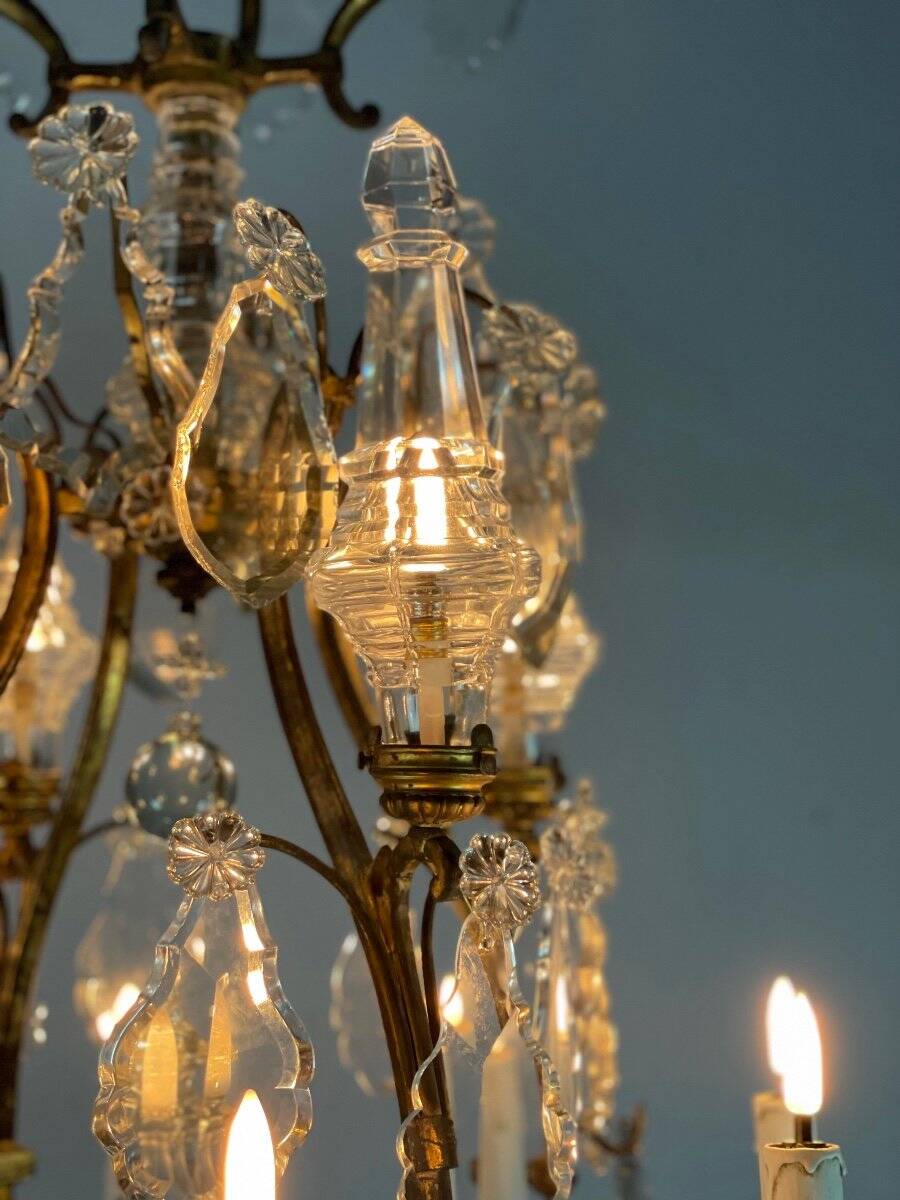 Bronze cage chandelier adorned with cut crystal pendants, 12 lights