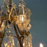 Bronze cage chandelier adorned with cut crystal pendants, 12 lights