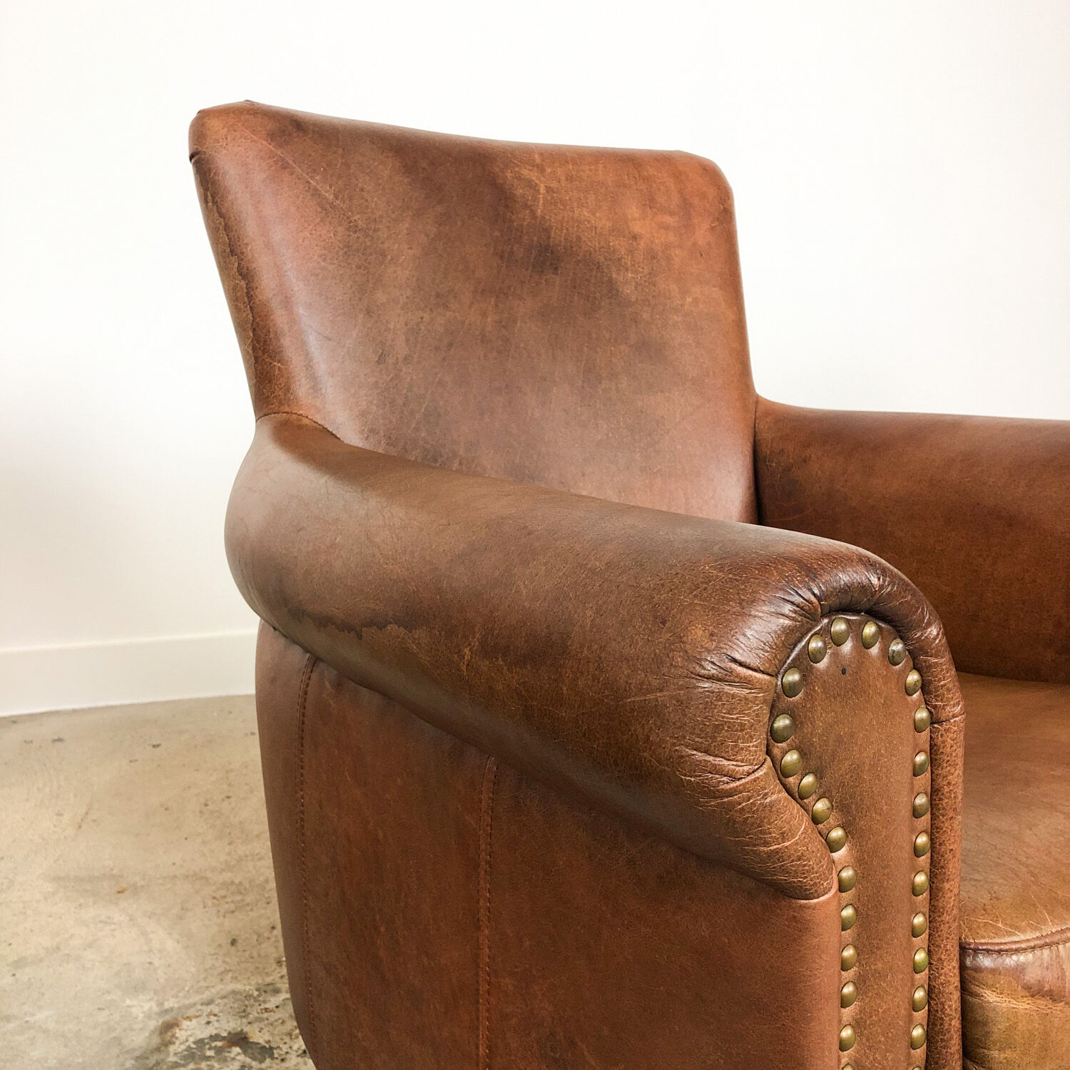 Set of two vintage leather armchairs