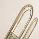 Pair of bevelled mirrors, brass edging frame in brushed wood years Italy 70's