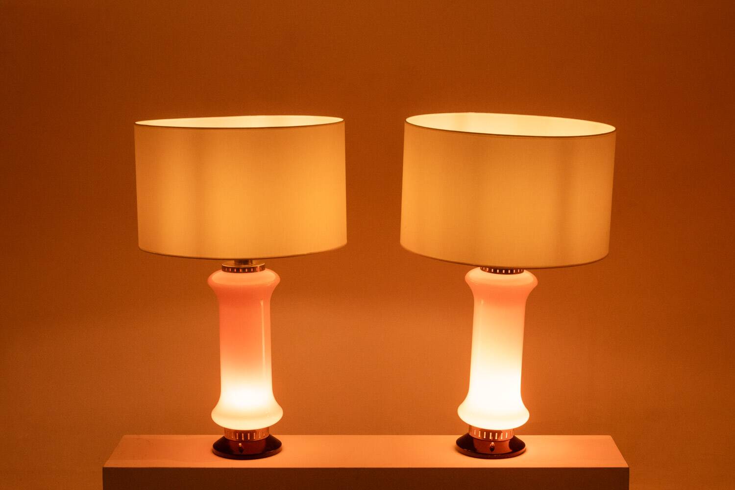 Pair of orange glass lamps. 1970s.