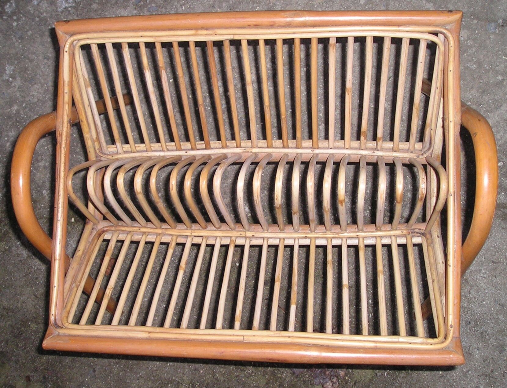 Magazine rack Wicker rattan of the 1970s vintage