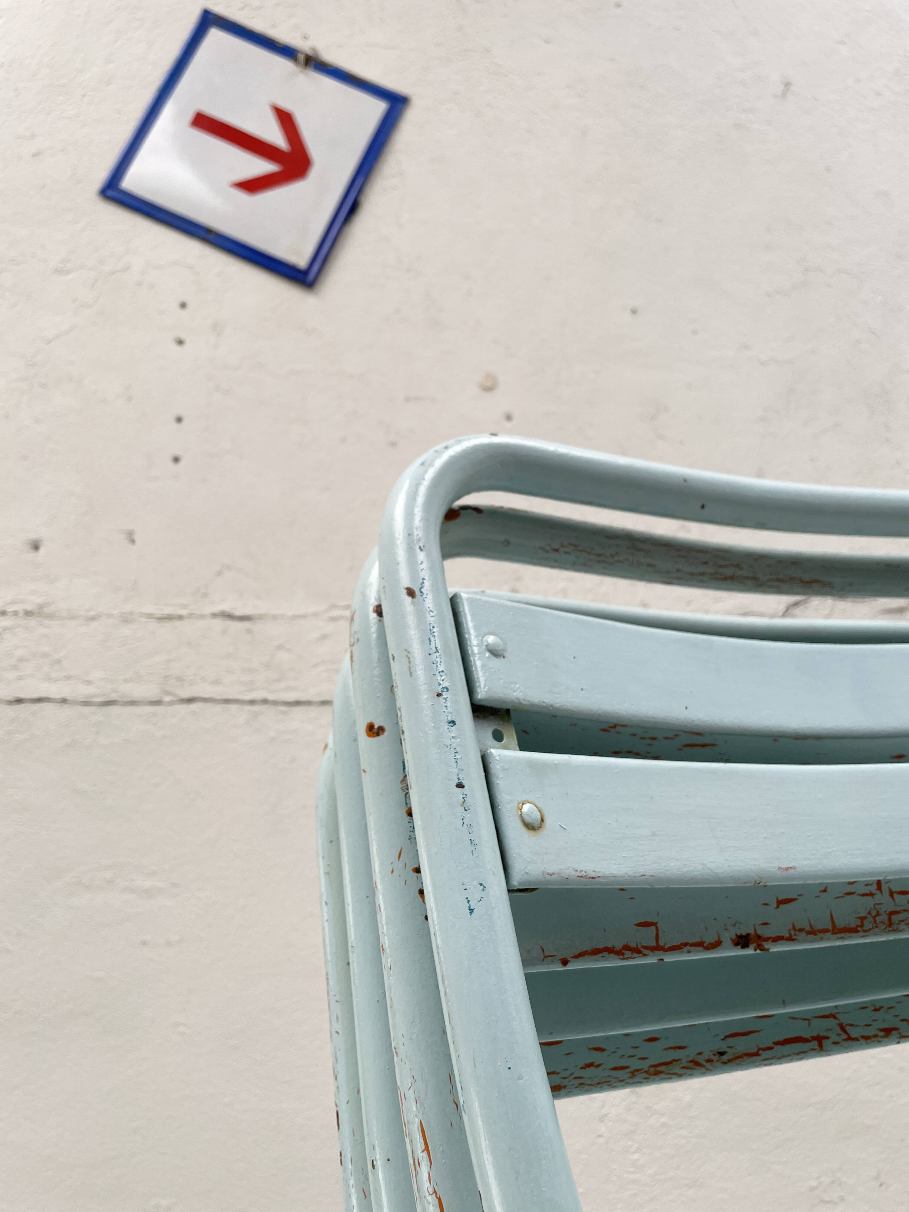 Set of four Tolix T2 chairs, circa 1950.