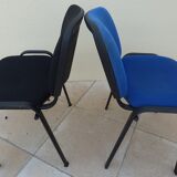 2 stackable chairs of black and blue fabrics