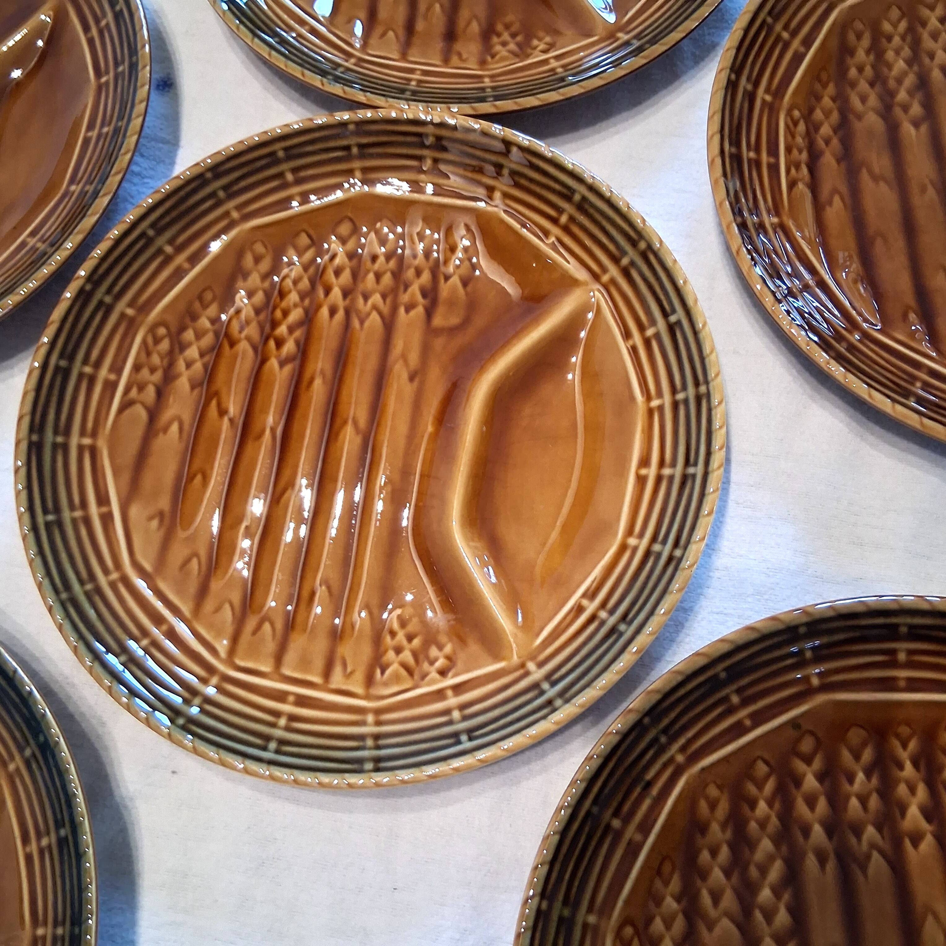 6 asparagus plates stamped "Sarreguemines" on the back in very good condition.