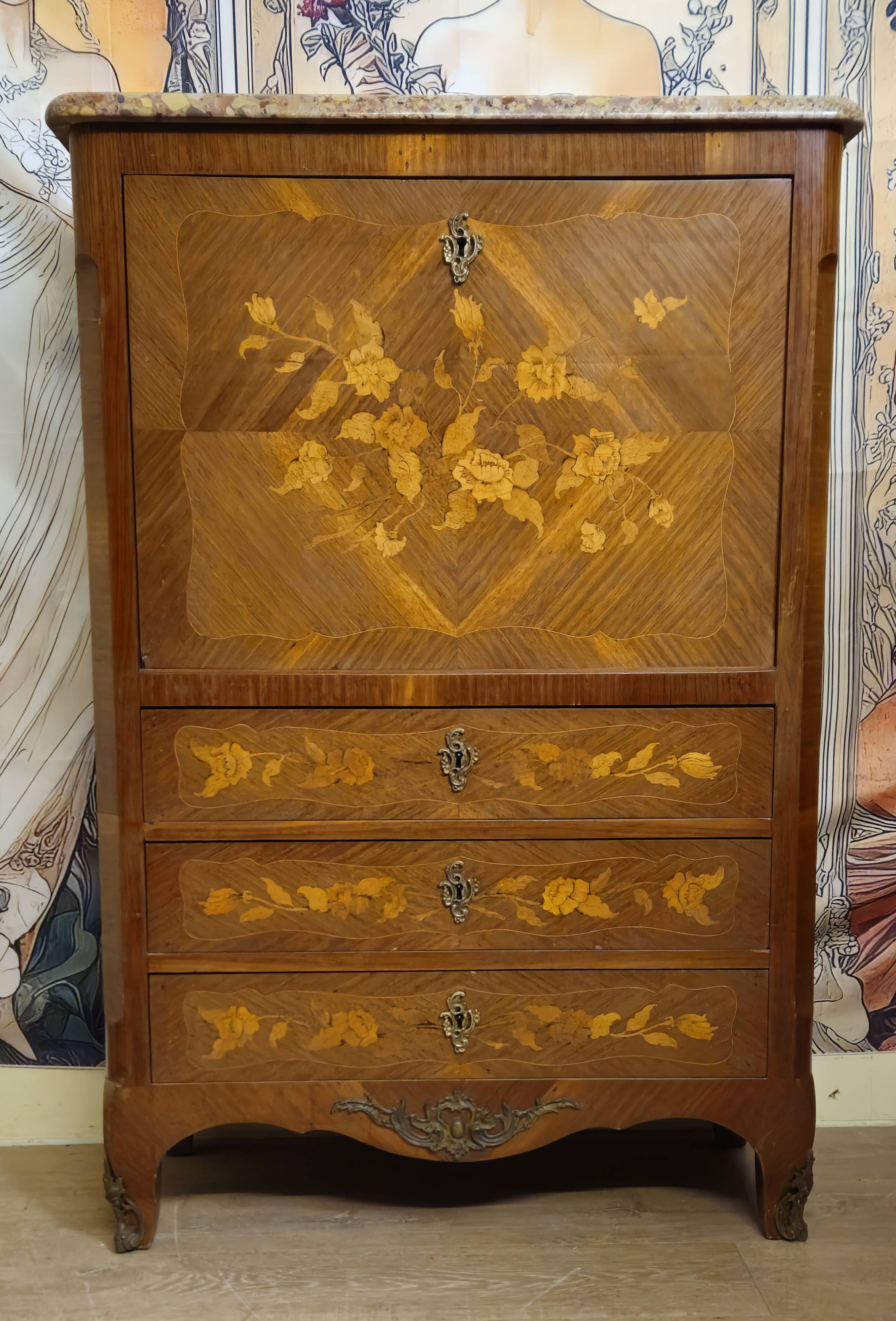Secretary with a curved drop-leaf in floral marquetry, mid-19th century.