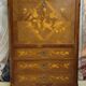 Secretary with a curved drop-leaf in floral marquetry, mid-19th century.