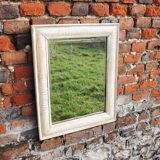 Antique mirror with whitewashed wood frame