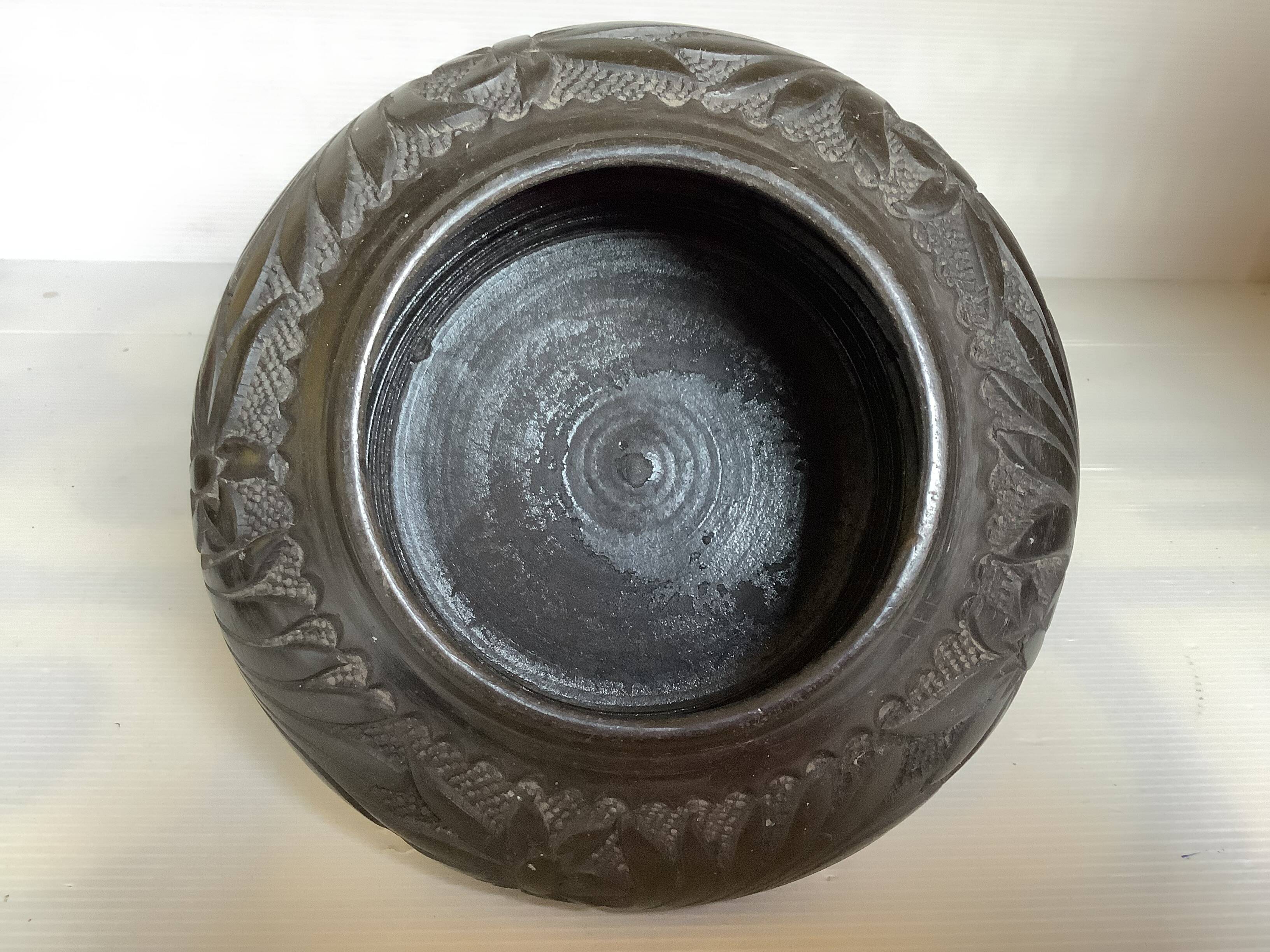 Black pottery catchall worked from Marginea, Romania.