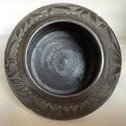 Black pottery catchall worked from Marginea, Romania.