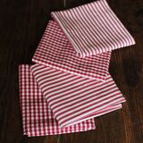 A set of 4 red gingham striped napkins
