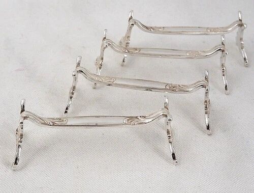 Christofle Chrysanthème, 4 silver-plated knife rests, excellent condition.