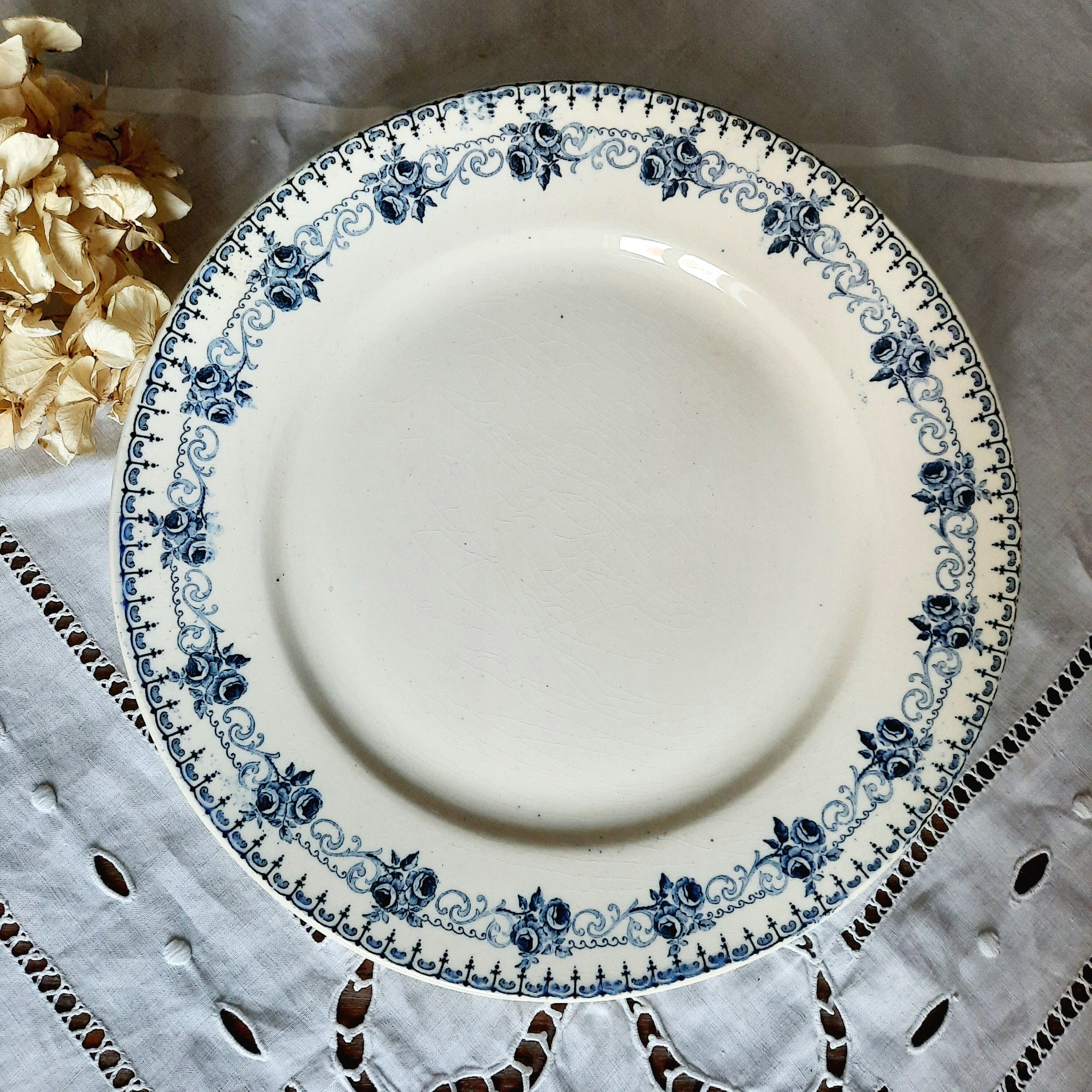 Old flat plates mismatched in earthenware