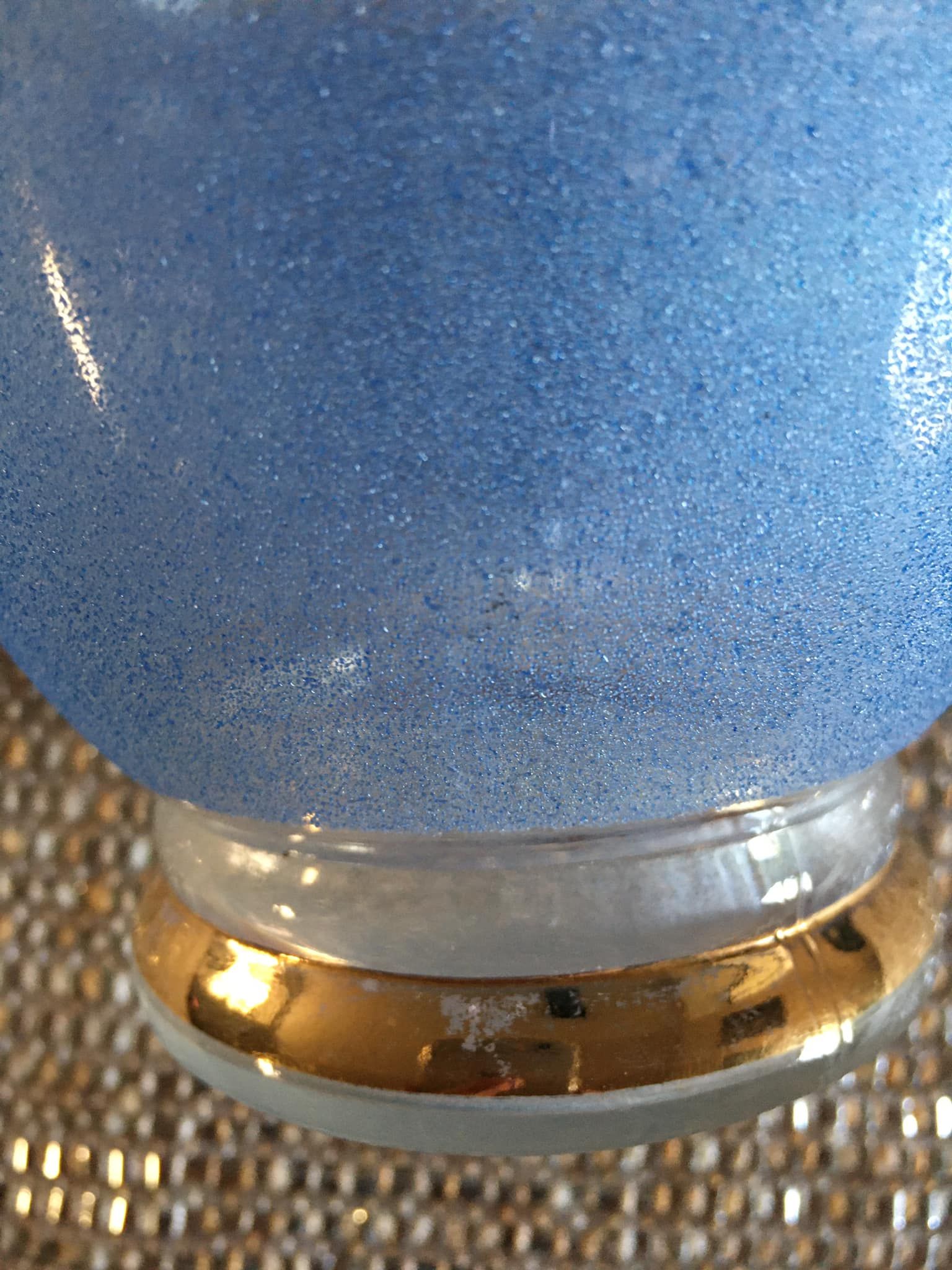 Antique carafe in blue granite glass and gilded edging