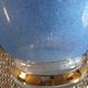 Antique carafe in blue granite glass and gilded edging