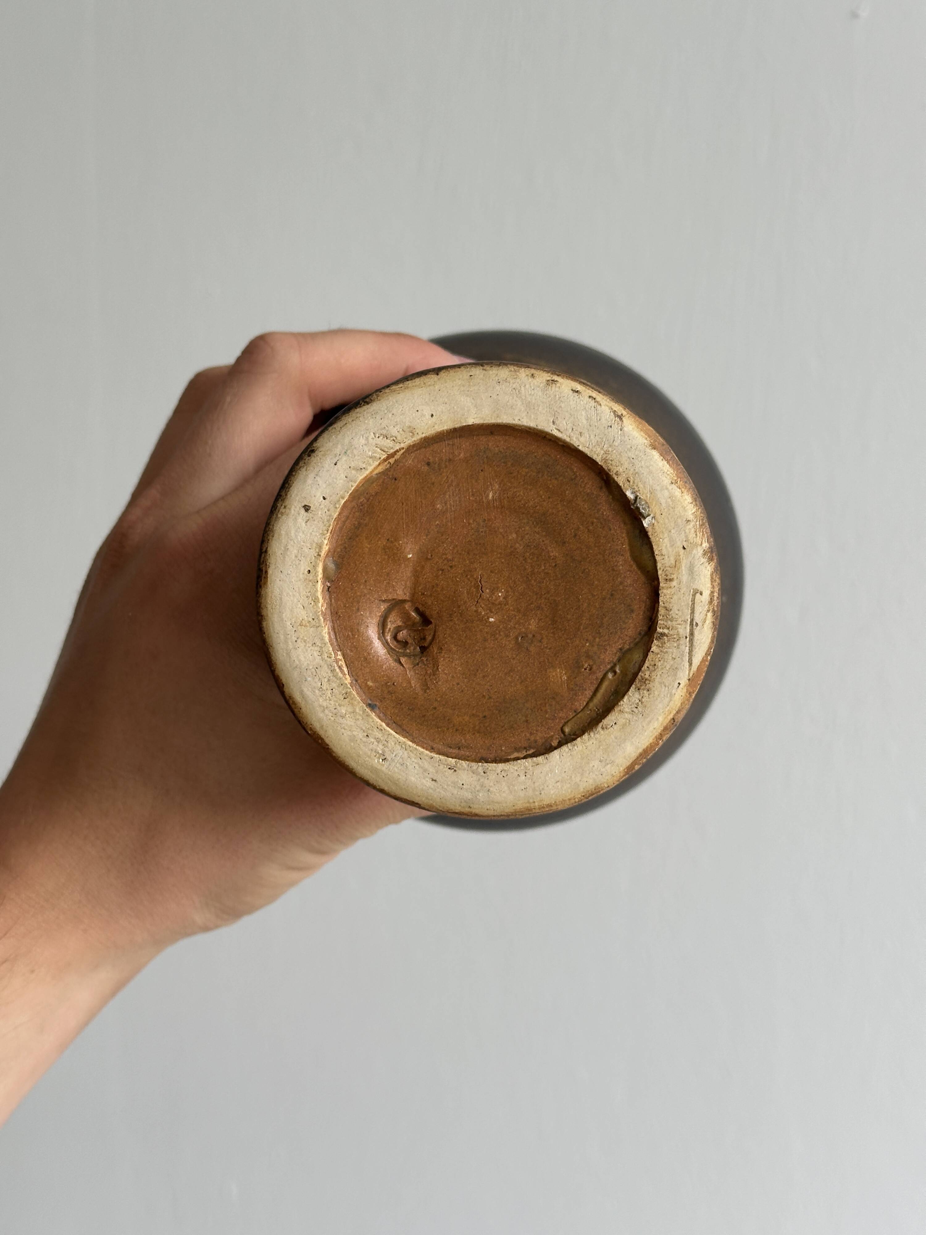 Dark brown raw ceramic cup