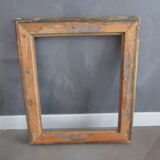 Old frame in wood and gilded stucco