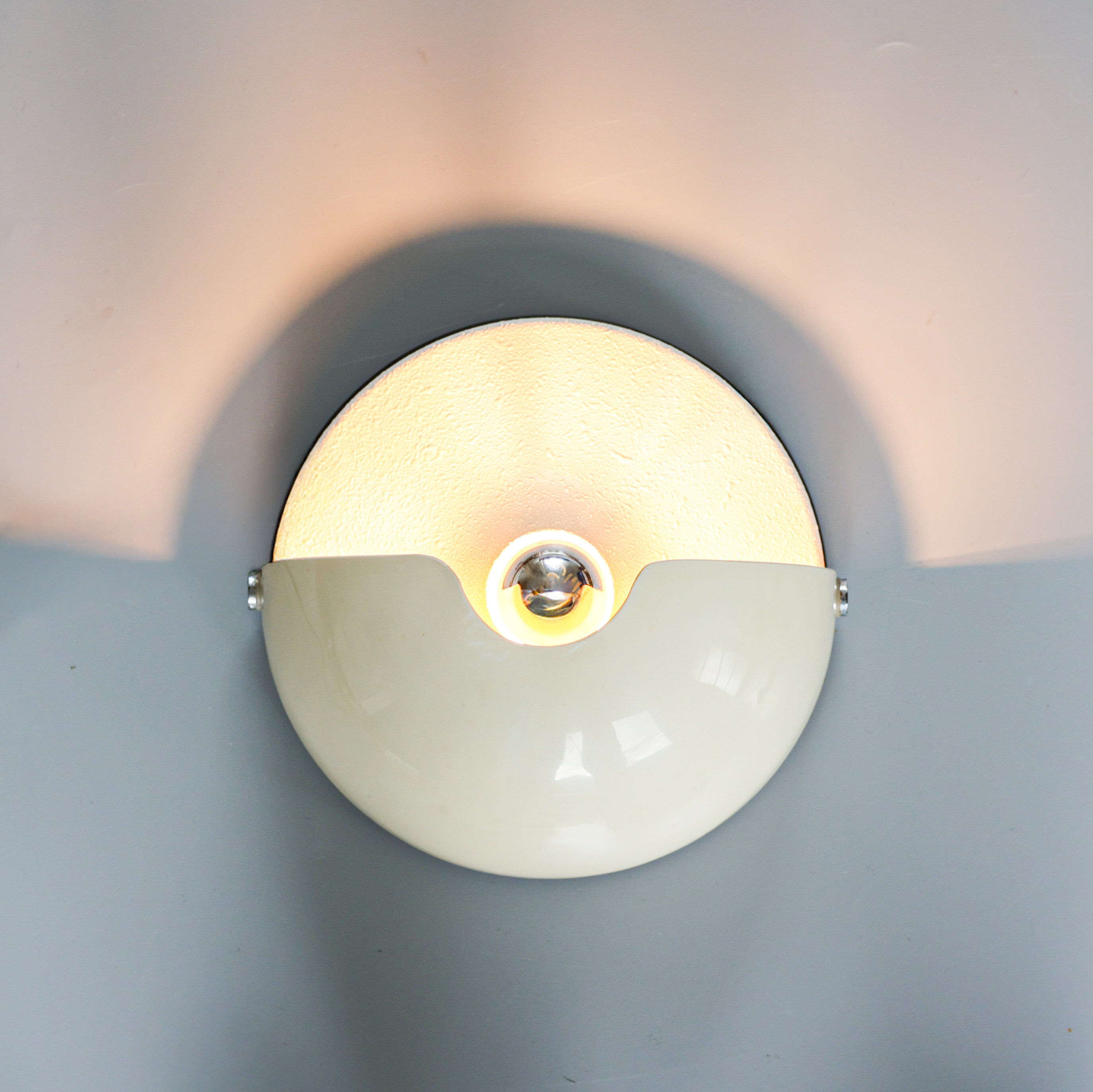 Vintage Harvey Guzzini 'Mezzanotte' sconce, 1970s.