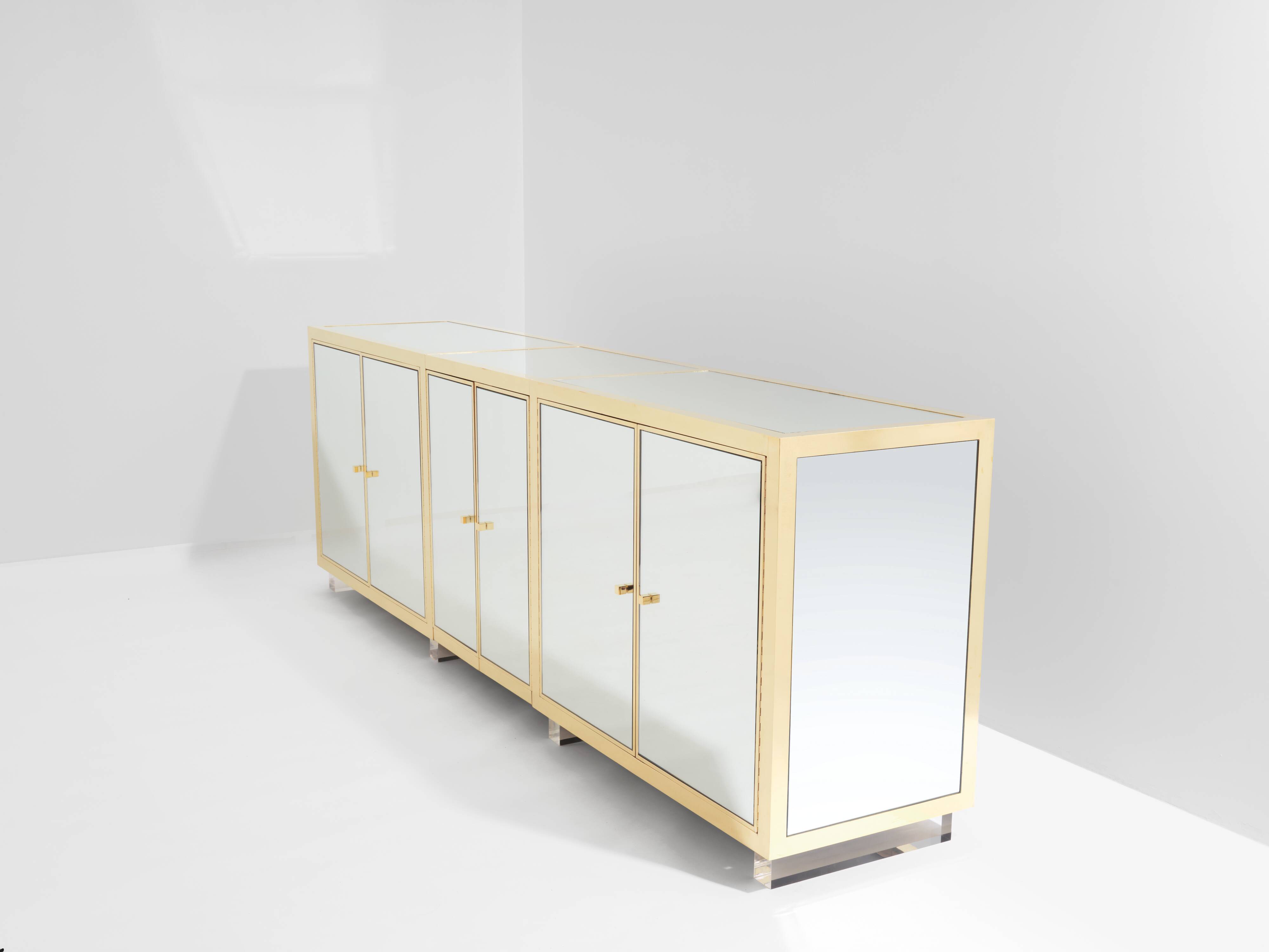 Brass sideboard with mirror and plexiglass legs by Michel Pigneres, 1970