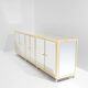 Brass sideboard with mirror and plexiglass legs by Michel Pigneres, 1970