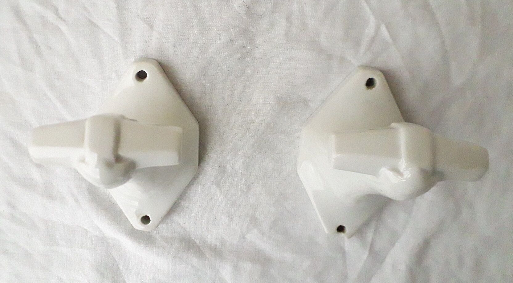 Pair of porcelain hooks