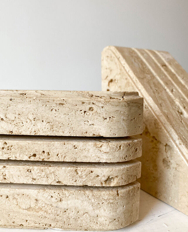 Pair of greenhouse travertine books Cerri Nestore