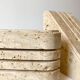 Pair of greenhouse travertine books Cerri Nestore