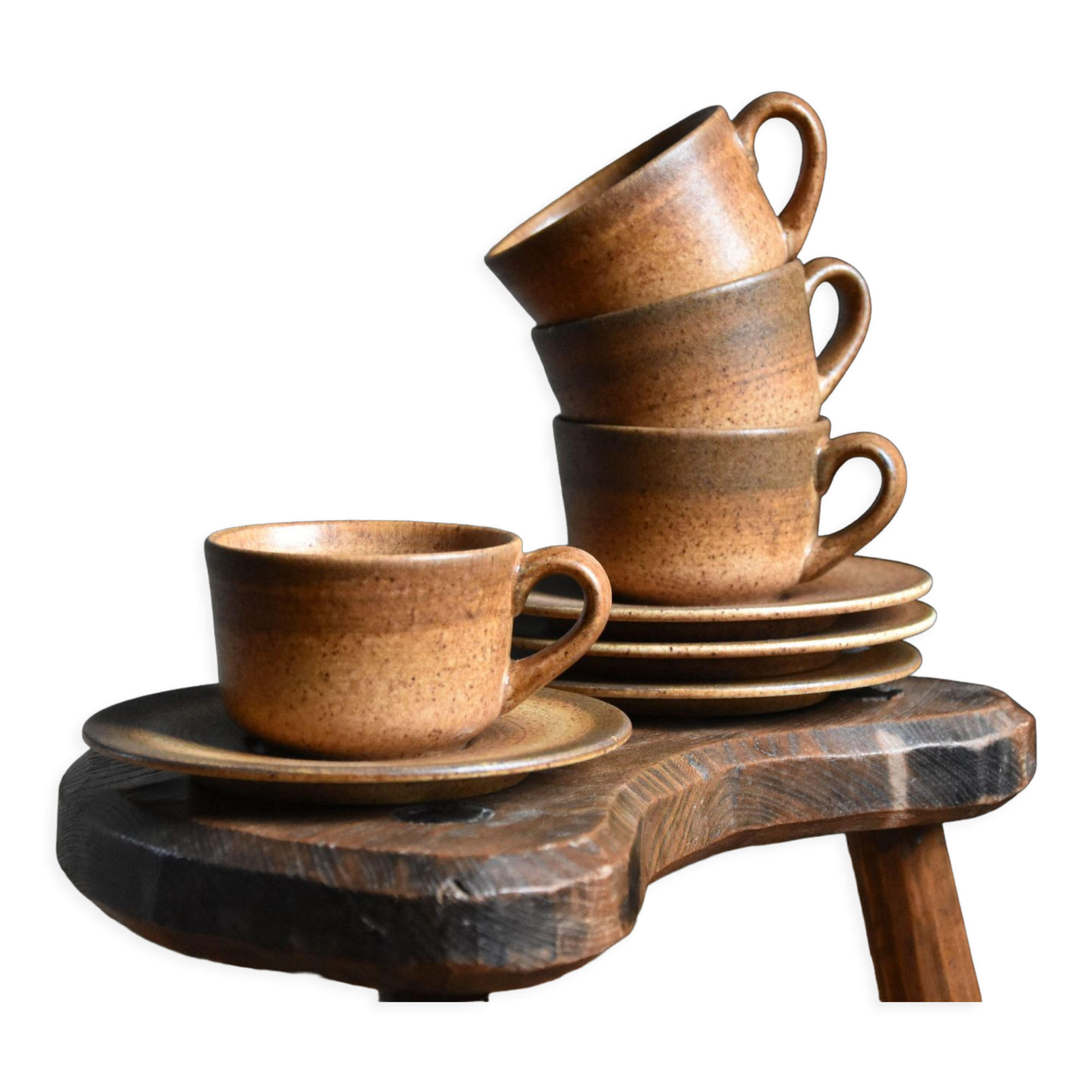 4 sandstone cups and saucers