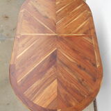 Oval table, integrated extension, in exotic wood