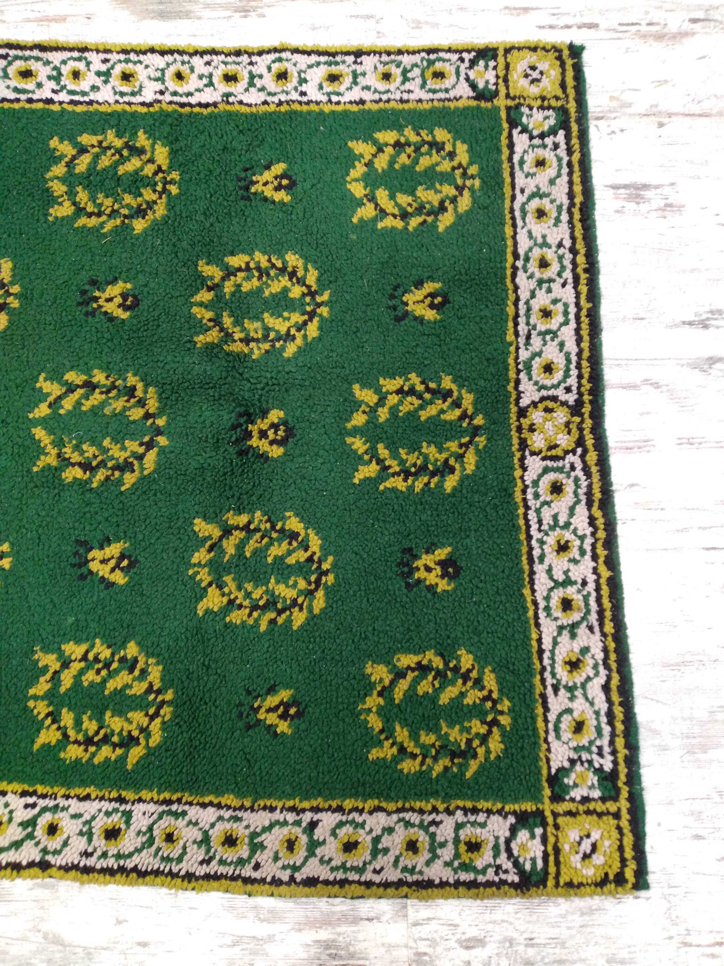 Antique green Berber rug