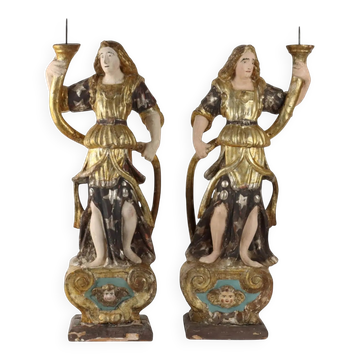 Antique wooden lacquered angel-shaped candlesticks, 18th century.