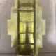 Round Art Deco wall light in brass.