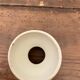 Vintage diabolo-shaped egg cup with burgundy patterns
