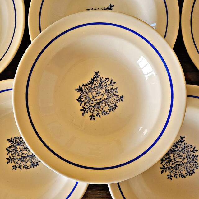Vintage deep plates in ADP earthenware, blue rose patterns.
