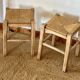 Pair of antique stools in raw solid wood with straw seats.