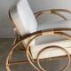 Large rattan rest chair and white cushions