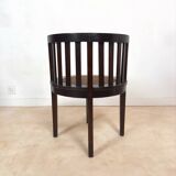 Colonial "Art Deco" armchair in wood and cane.