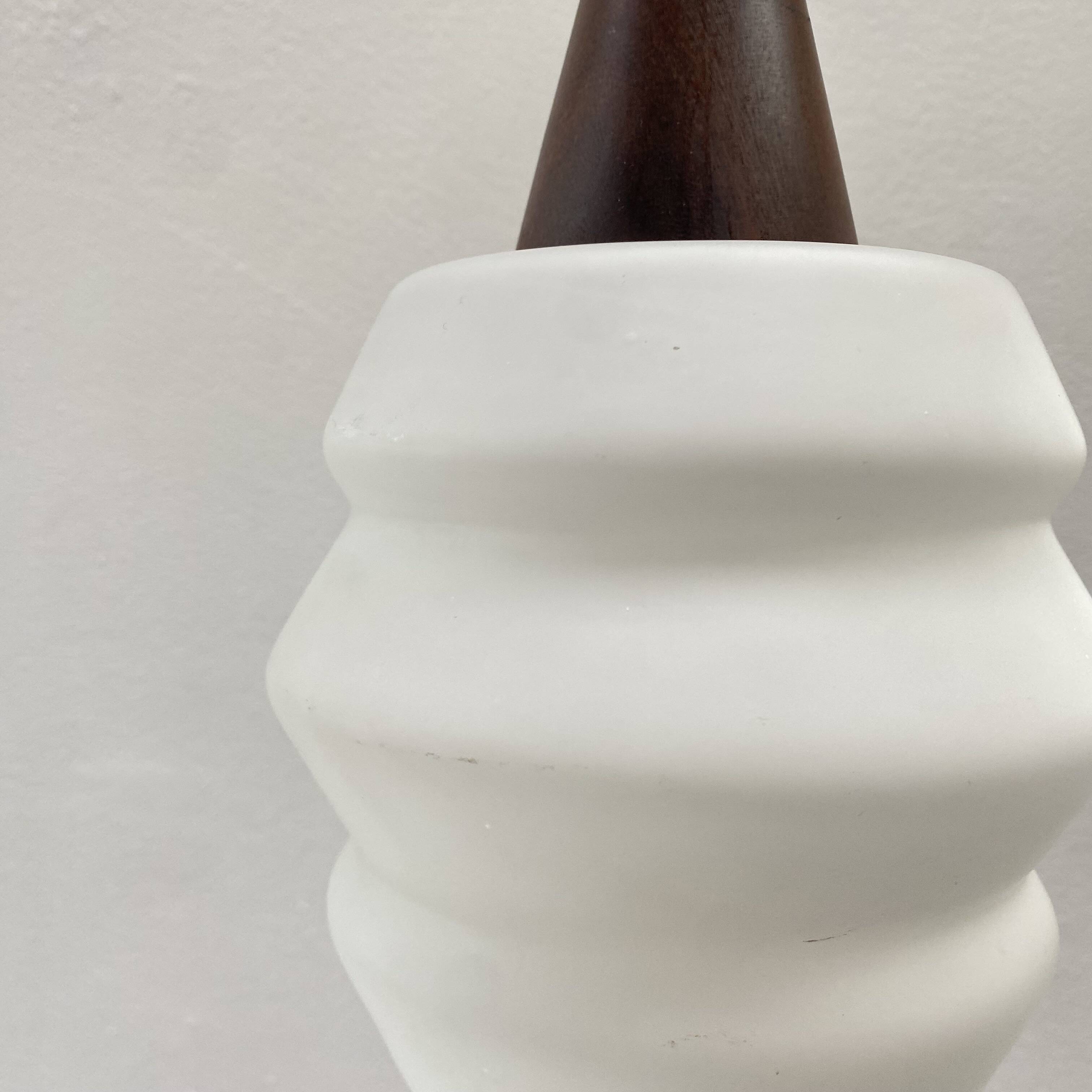 Teak and opaline pendant light from the 60s by Louis Kalff for Philips