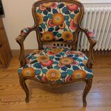 Voltaire armchair with a rack, wheels, and a toad chair in matching fabric.