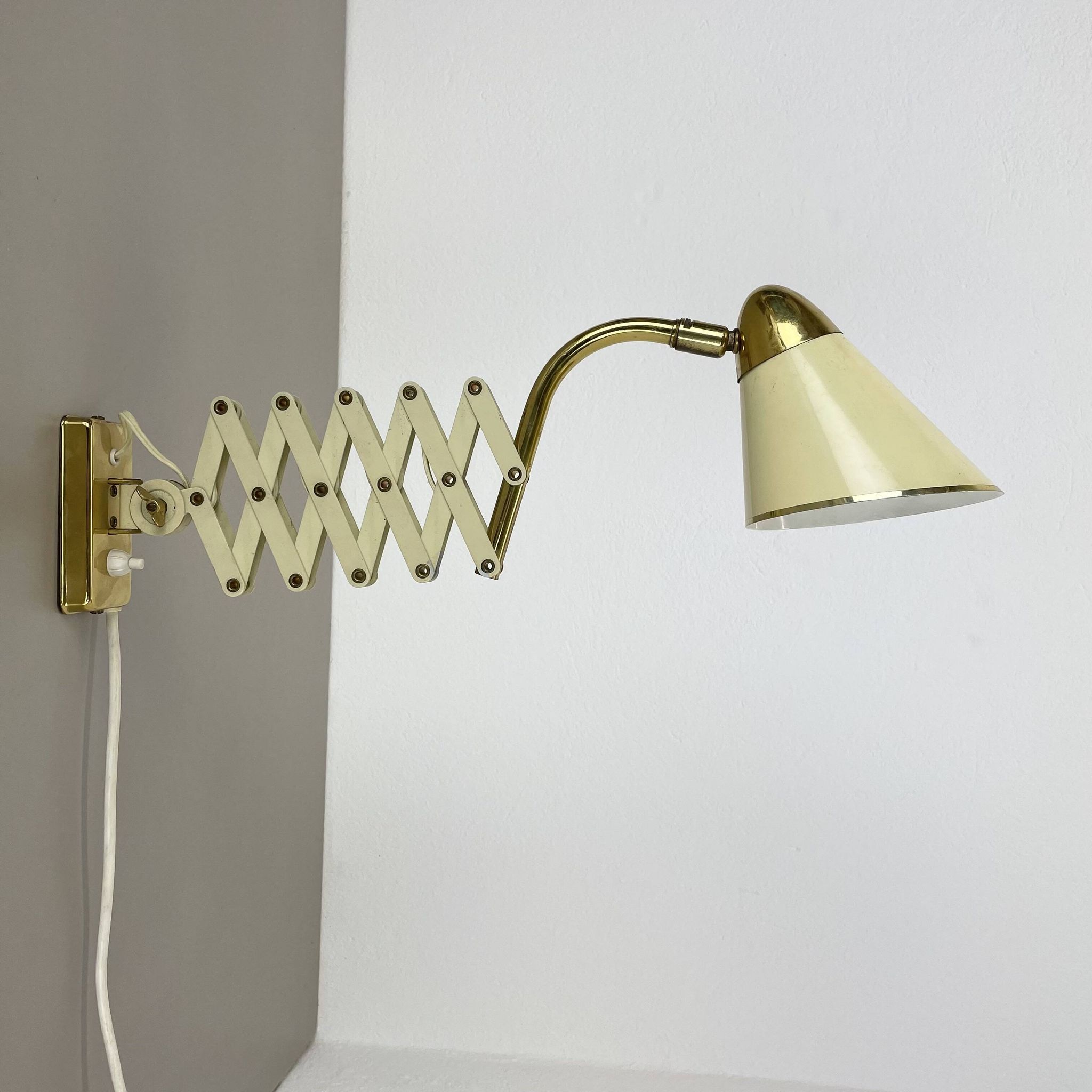 Original brass and metal scissors wall light by SIS Leuchten, Germany, 1950s.