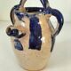 Old pitcher (goat) in cobalt glazed earthenware