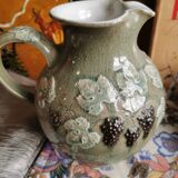 Pitcher decorated with bunches of grapes