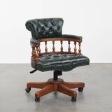 Dark green chesterfield office chair in cowhide leather on wheels