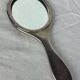 Silver metal hand mirror