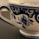 Old mustache cup and its under cup, Rouen earthenware