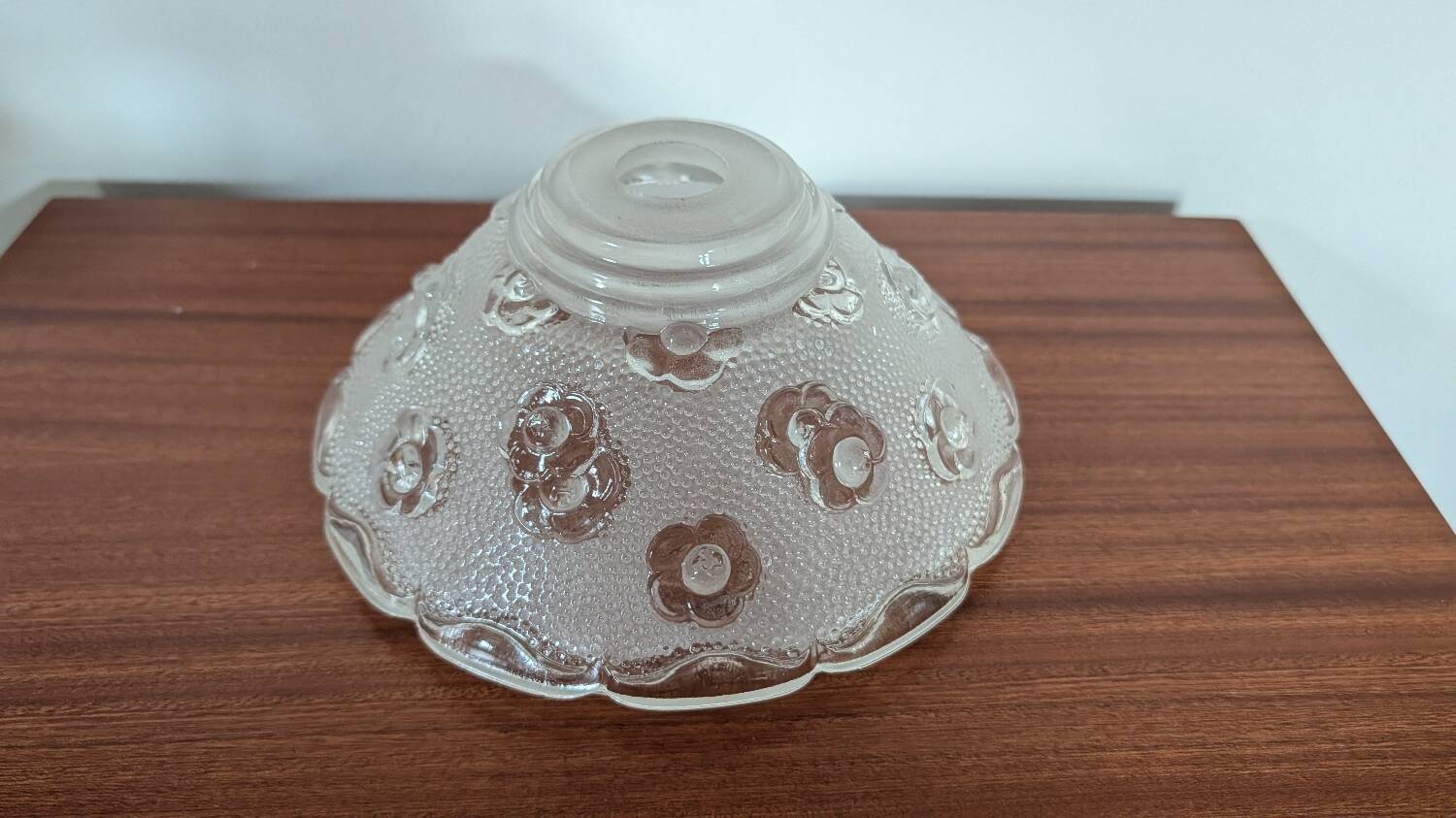 Moulded glass lampshade with floral decoration, granite texture.