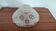 Moulded glass lampshade with floral decoration, granite texture.