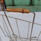 Vintage magazine rack in golden brass